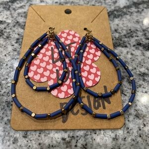 Earrings, blue with gold beaded accents.